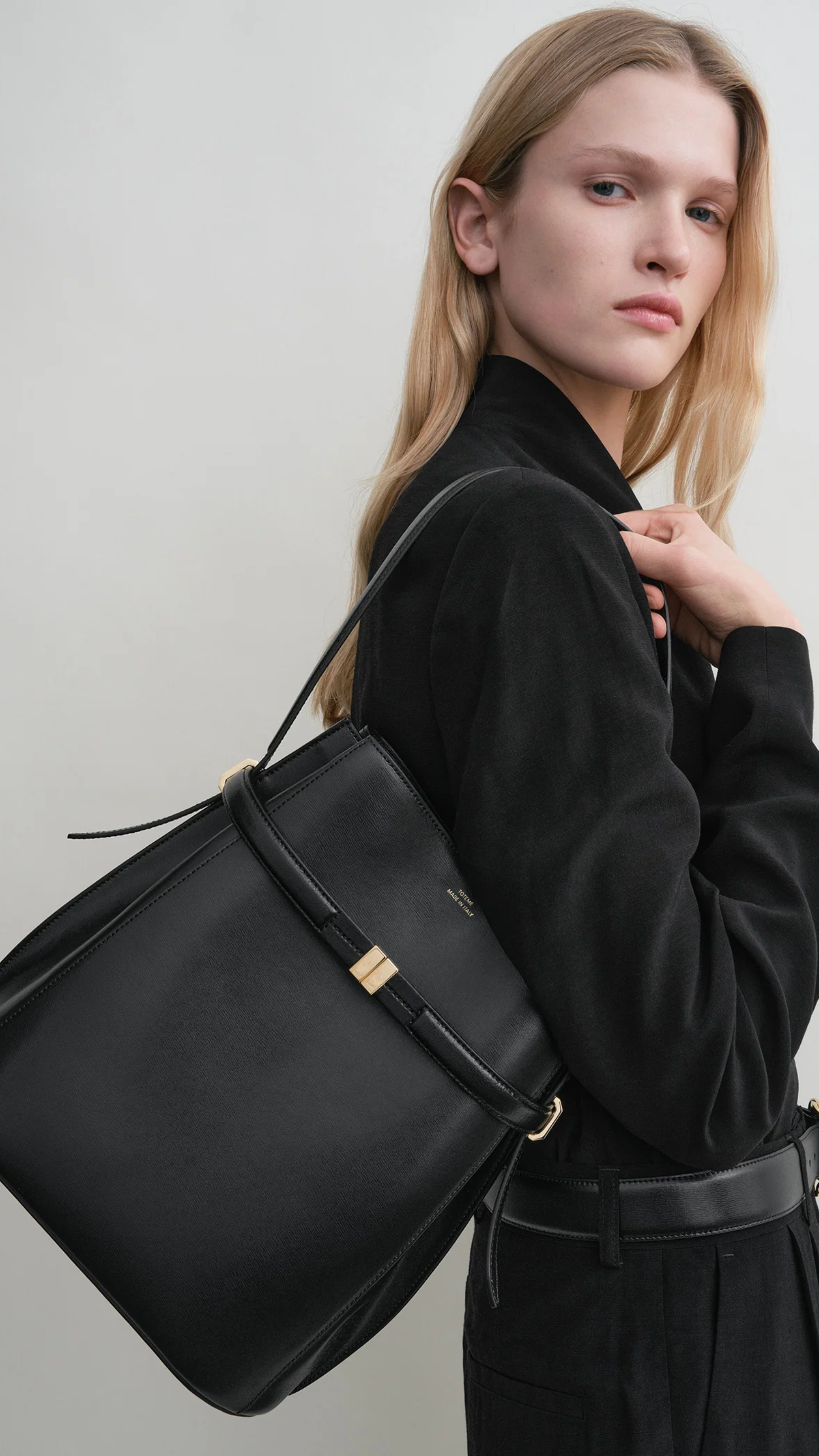 Toteme Belted Leather Bucket Bag in Black