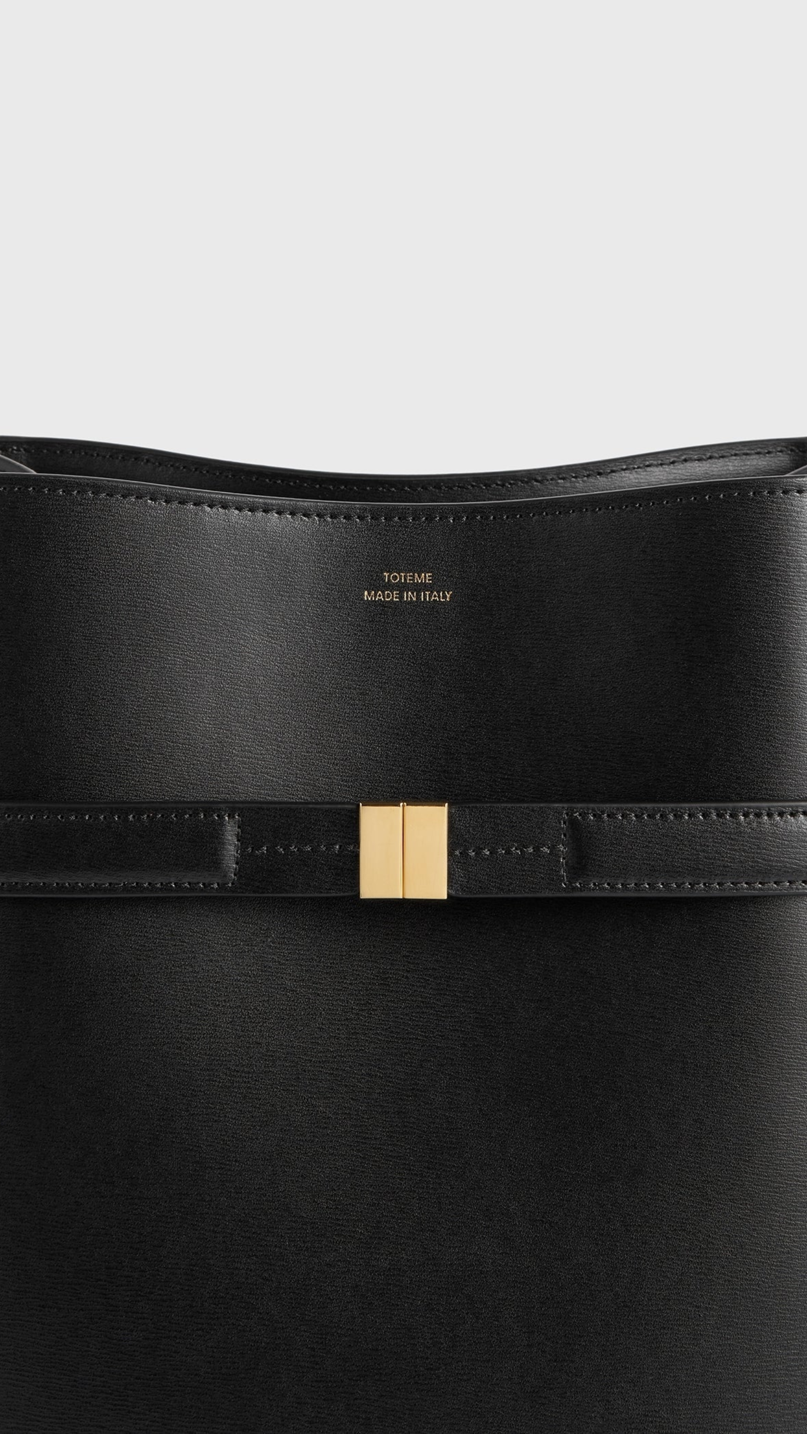 Toteme Belted Leather Bucket Bag in Black