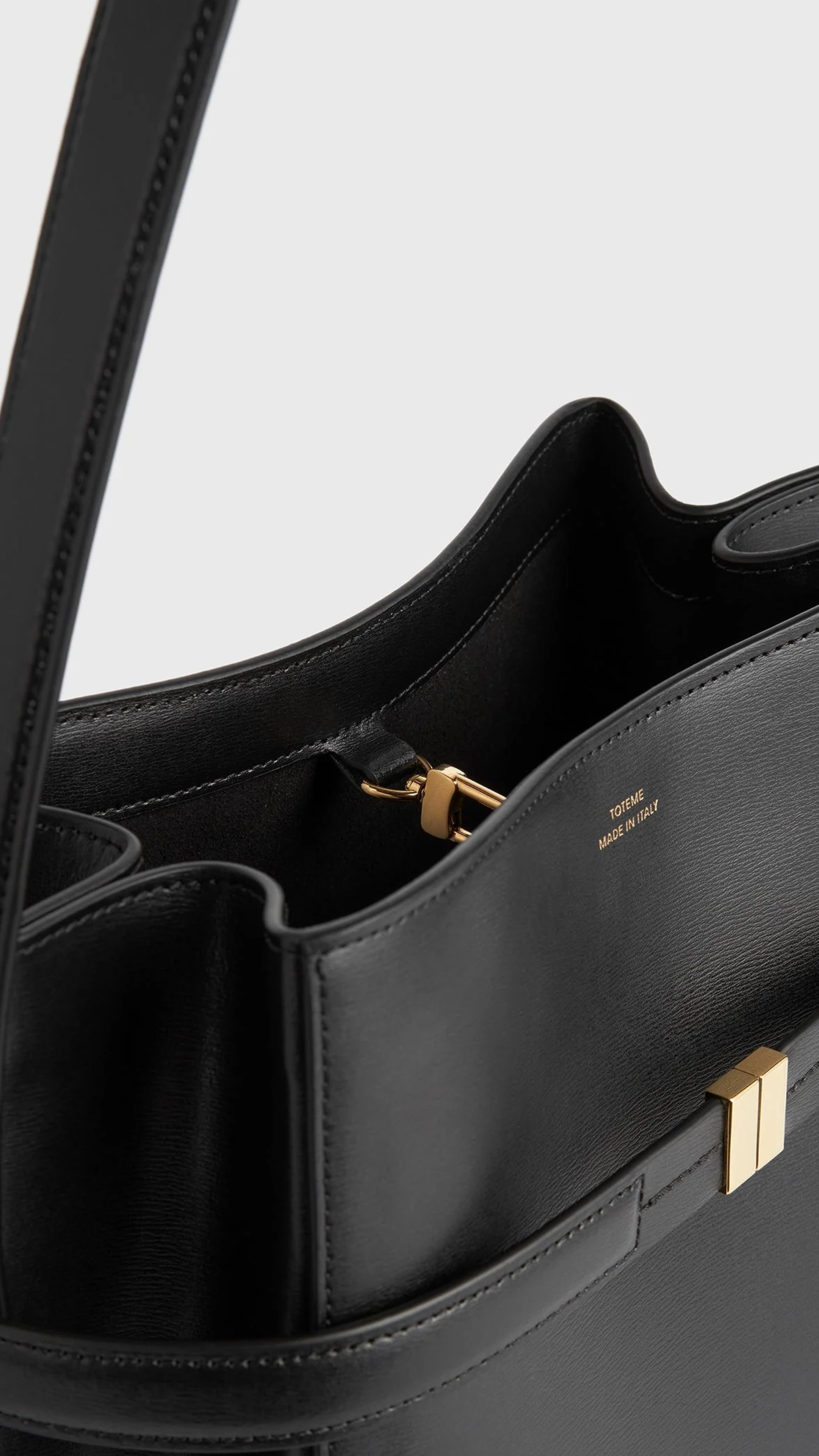 Toteme Belted Leather Bucket Bag in Black