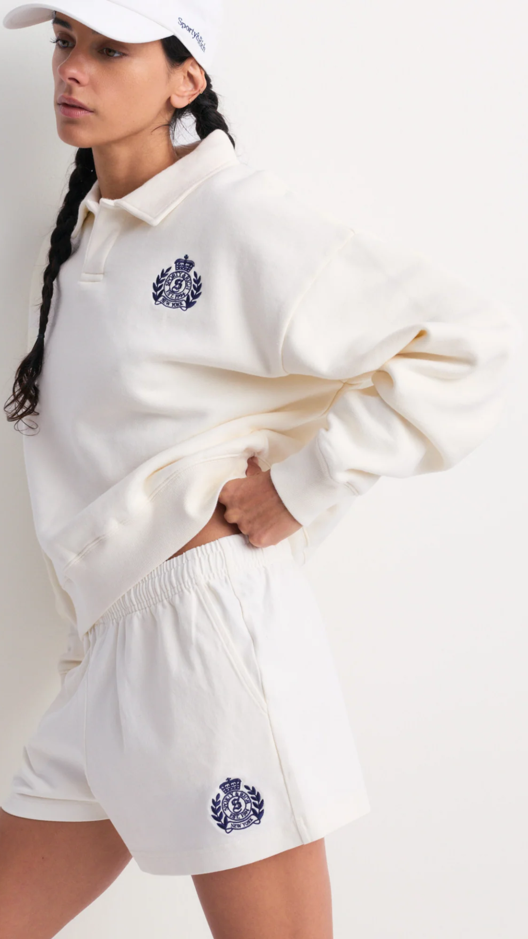 Sporty & Rich Elfa NY Crest Embroidered Open Polo in Off White