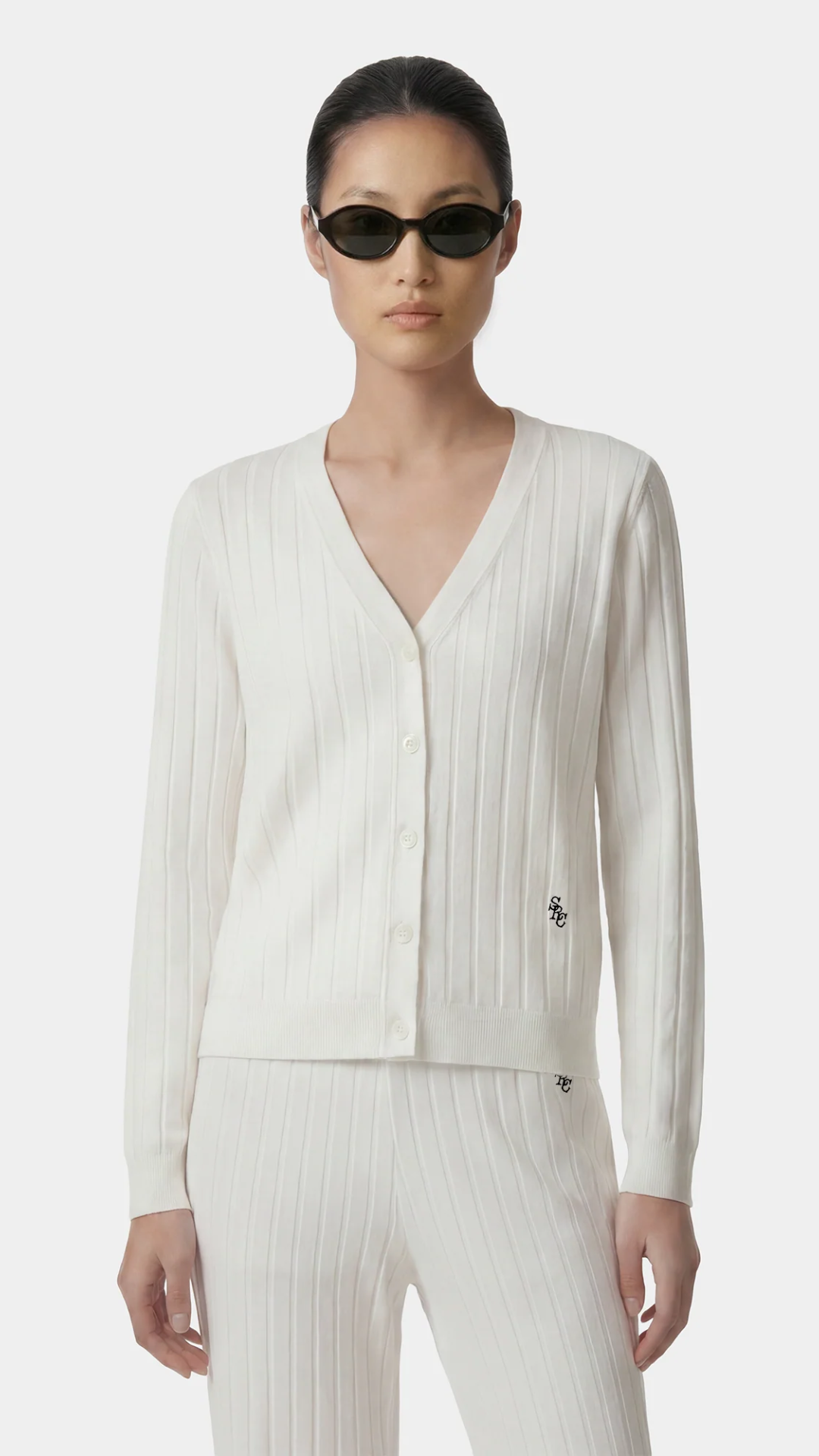 Sporty & Rich SRC Ribbed Cardigan in Ecru/Navy