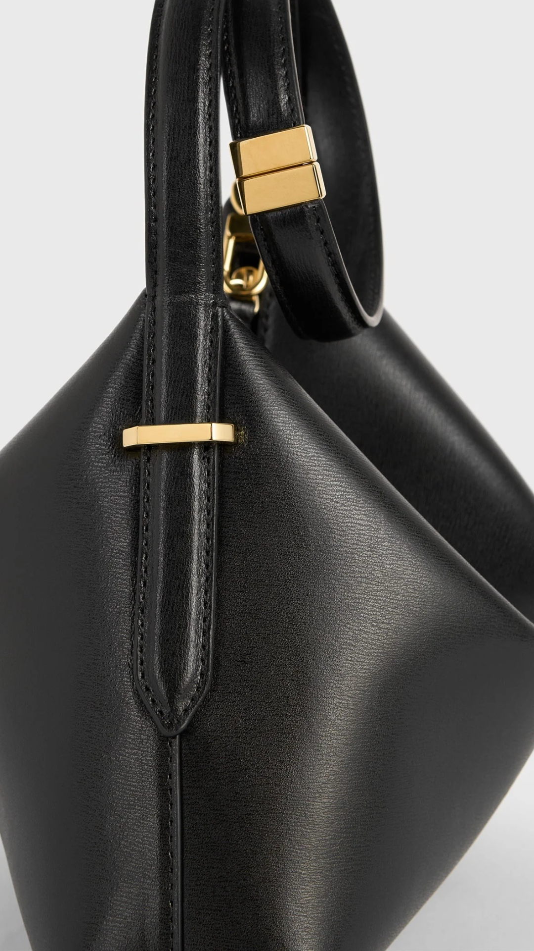 Toteme Bevel Leather Wristlet Bag in Black