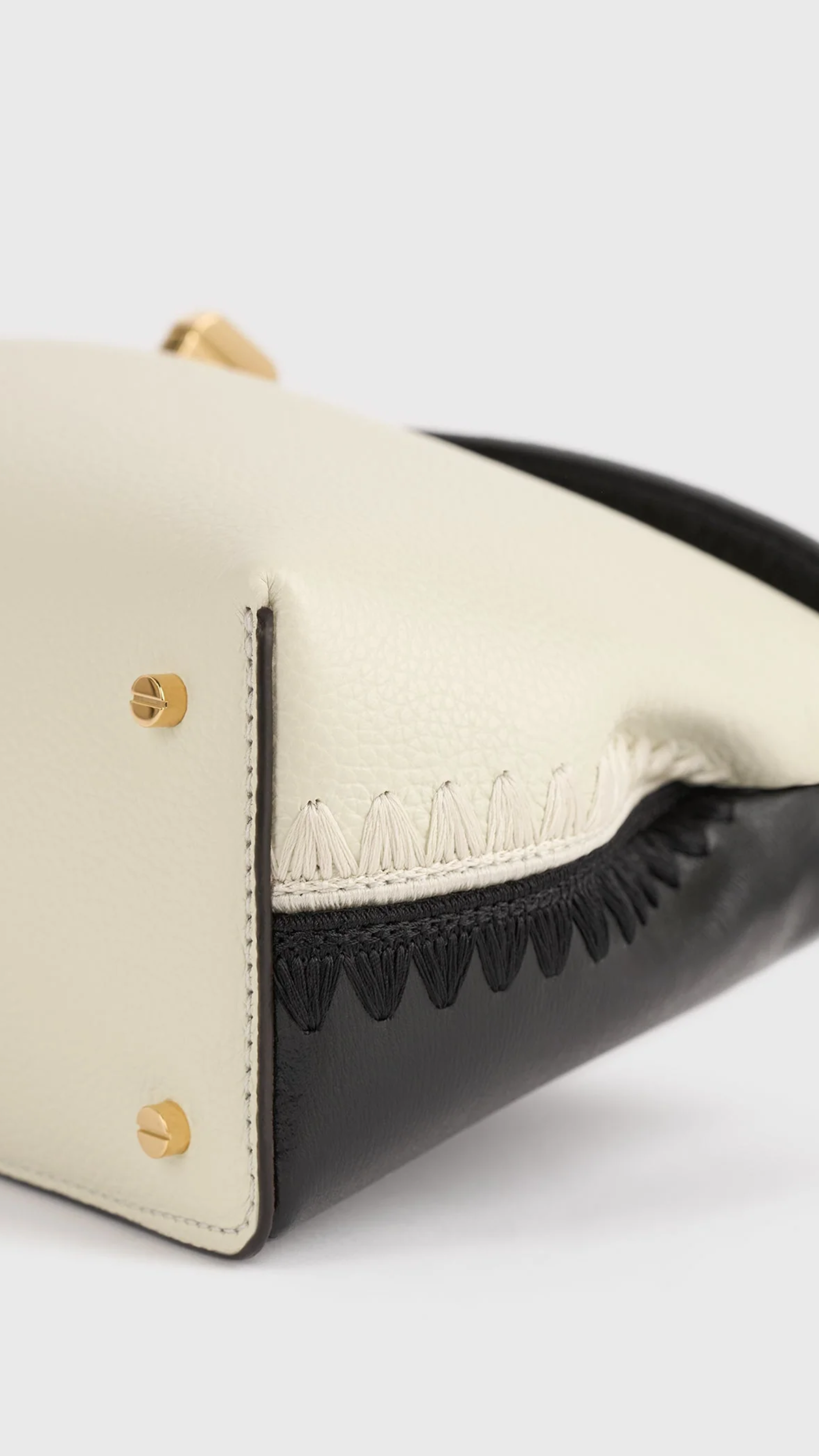 Toteme T-lock Embroidered Leather Clutch in Black Milk