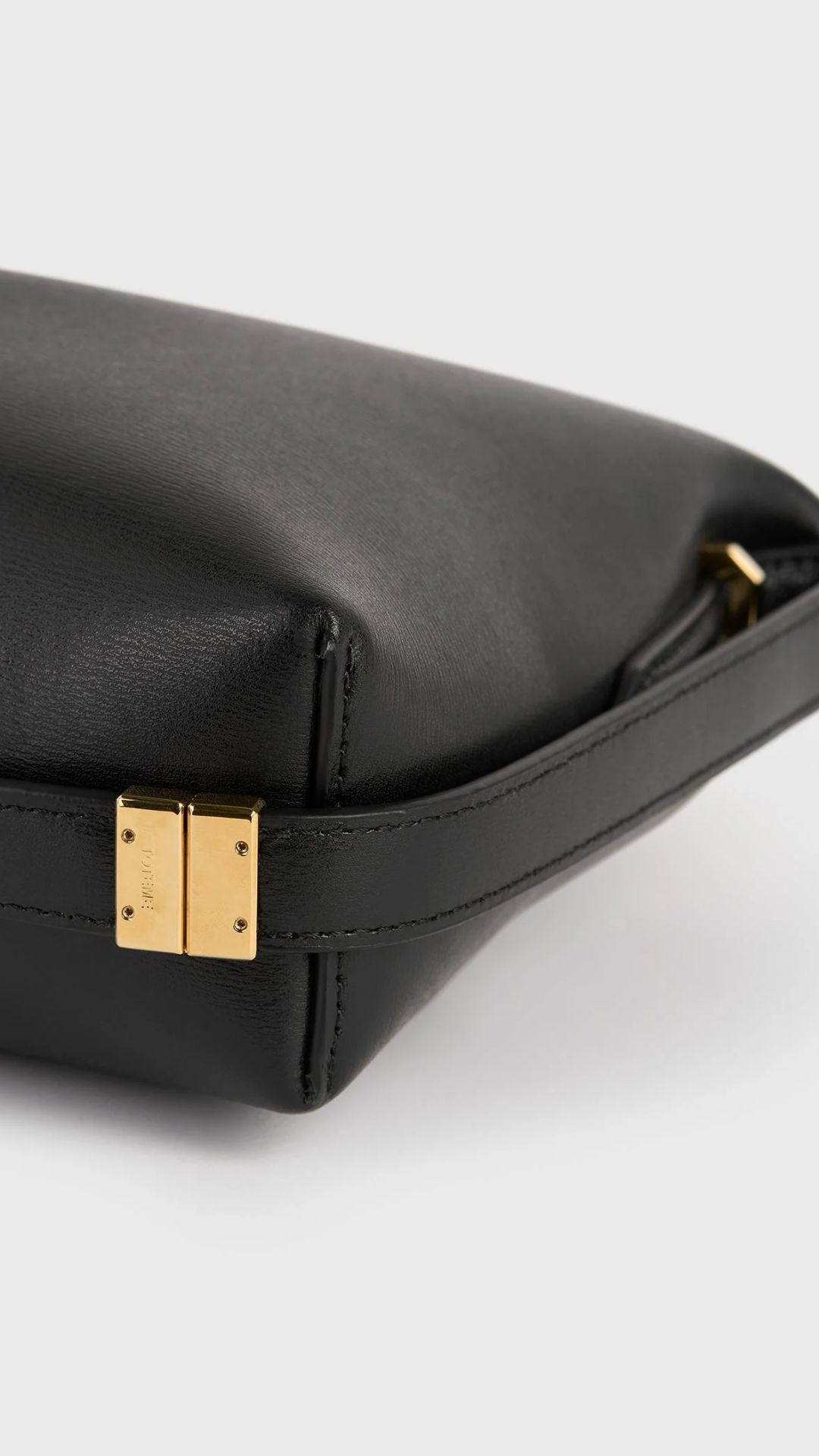 Toteme Bevel Leather Wristlet Bag in Black