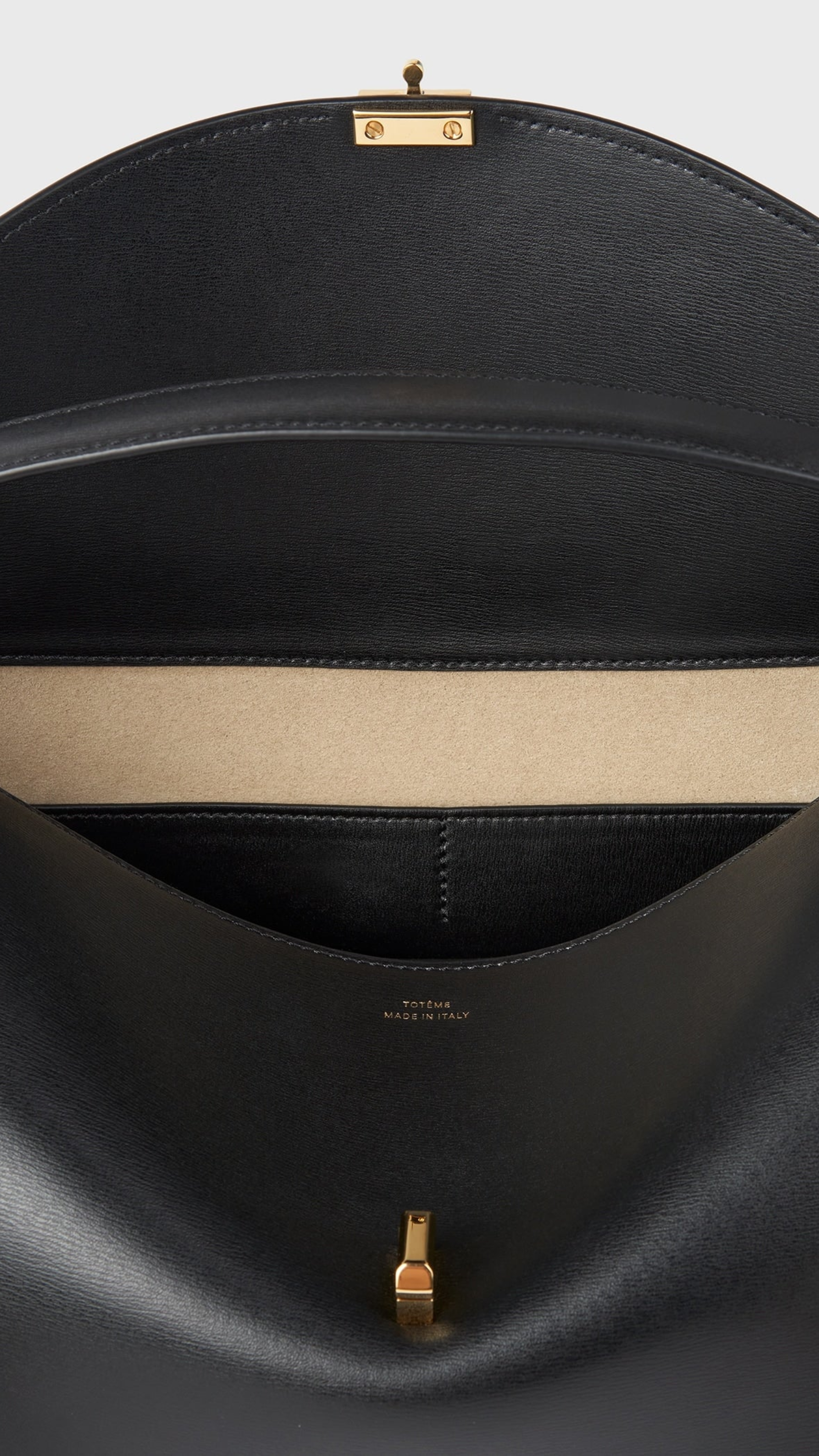 Toteme T-lock Leather Top Handle Bag in Black