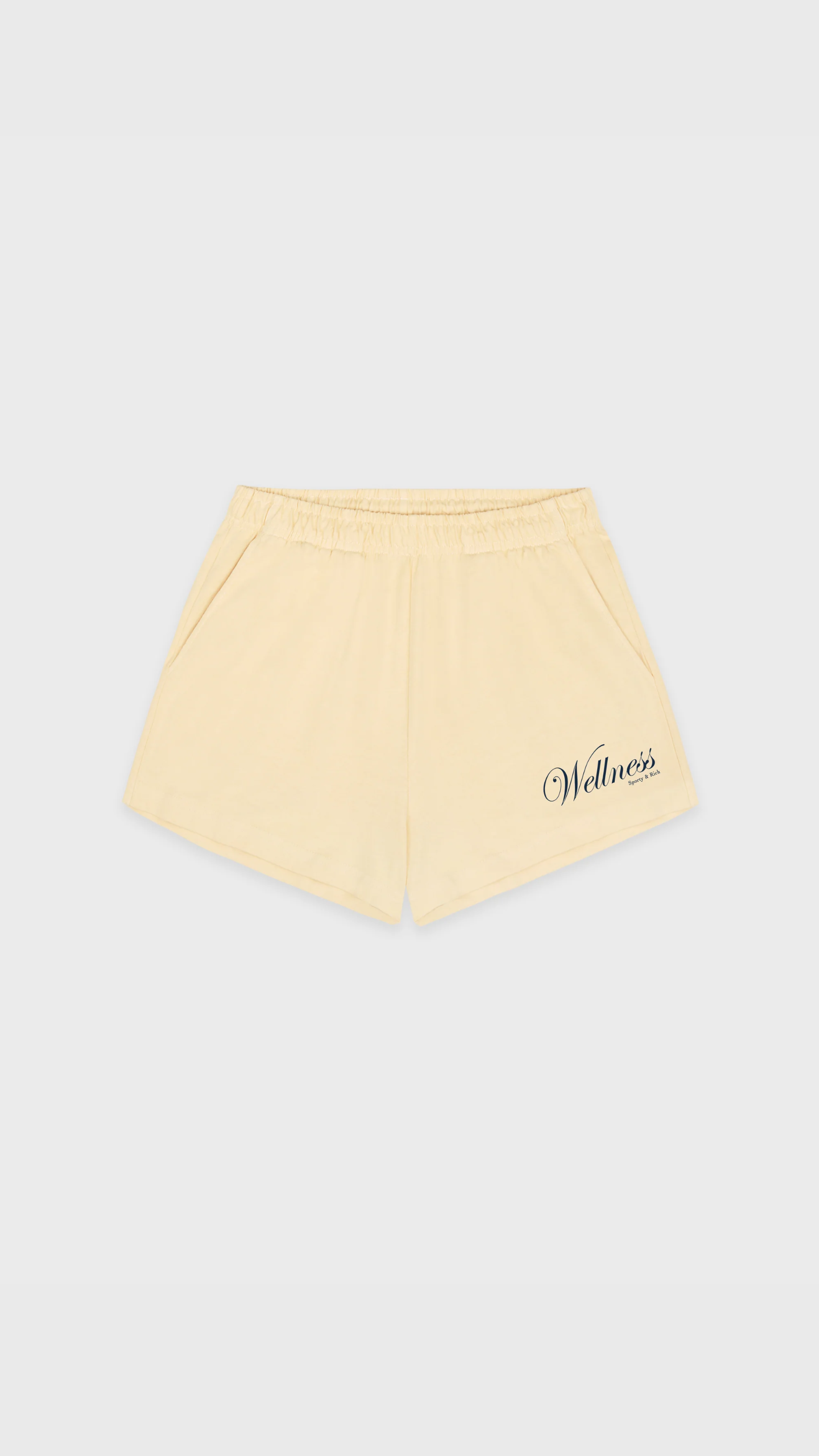 Sporty & Rich Avenue Disco Short in Almond/Navy