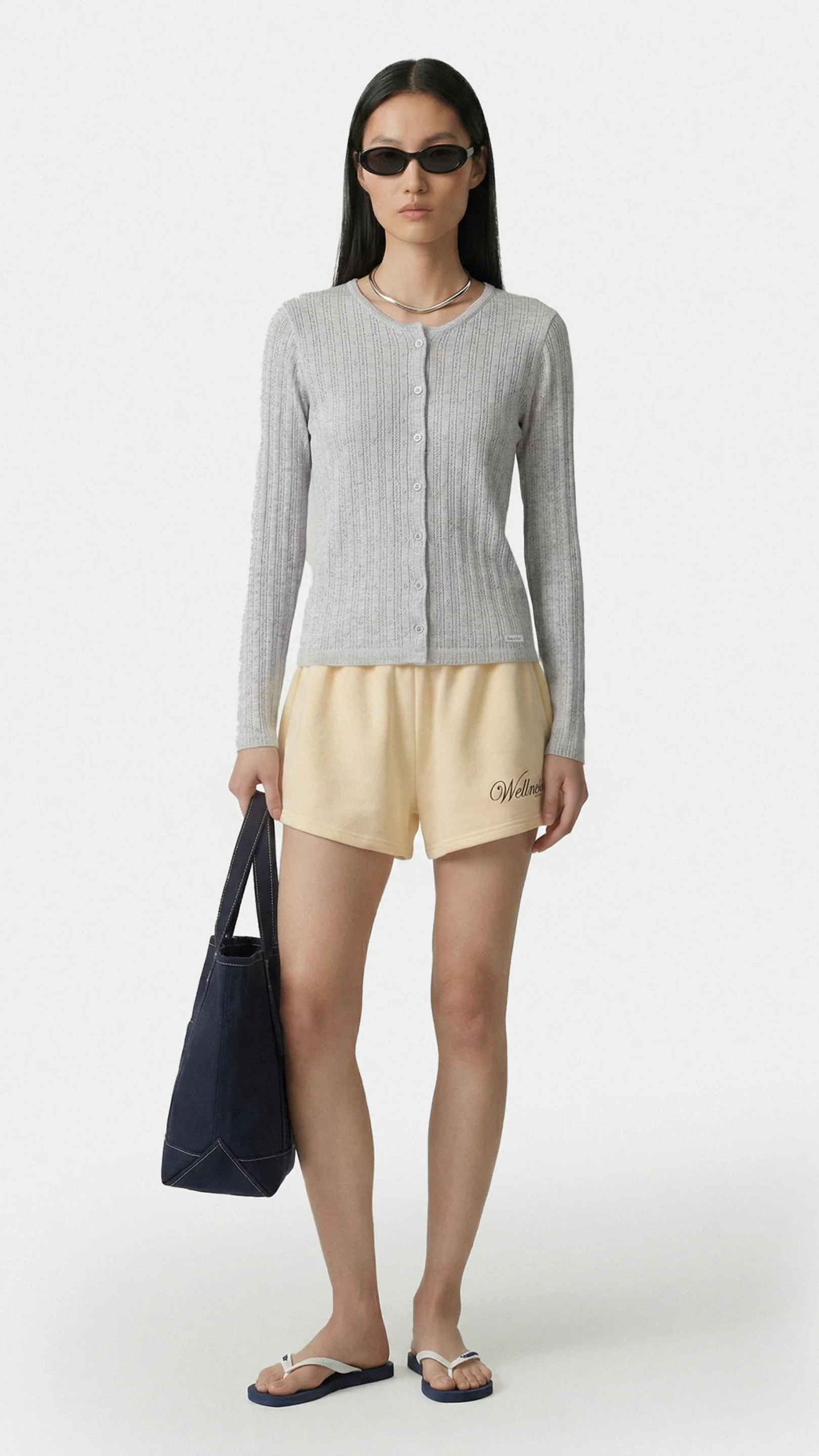 Sporty & Rich Avenue Disco Short in Almond/Navy