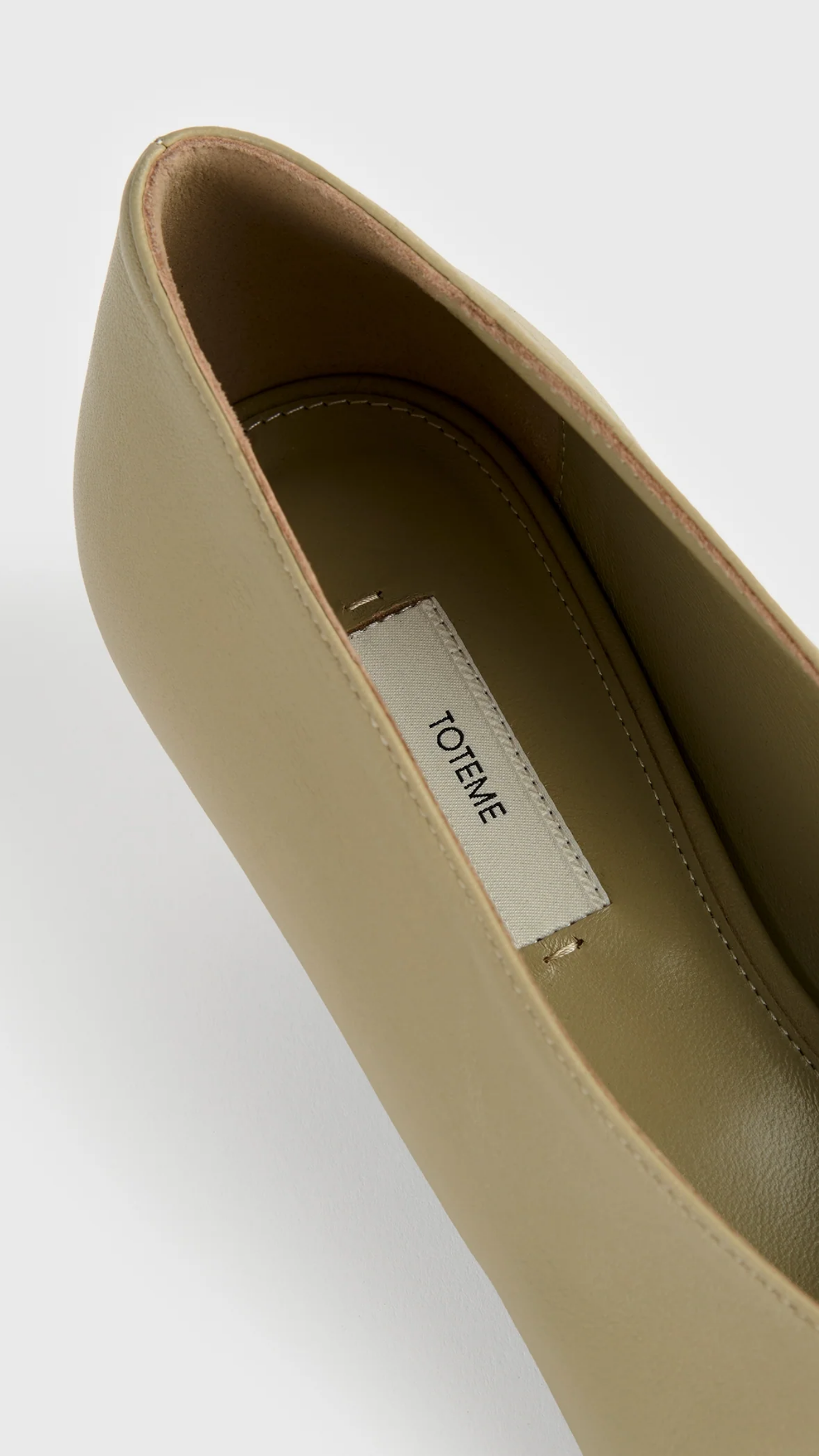 Toteme Pierced Nappa Pumps in Cashew