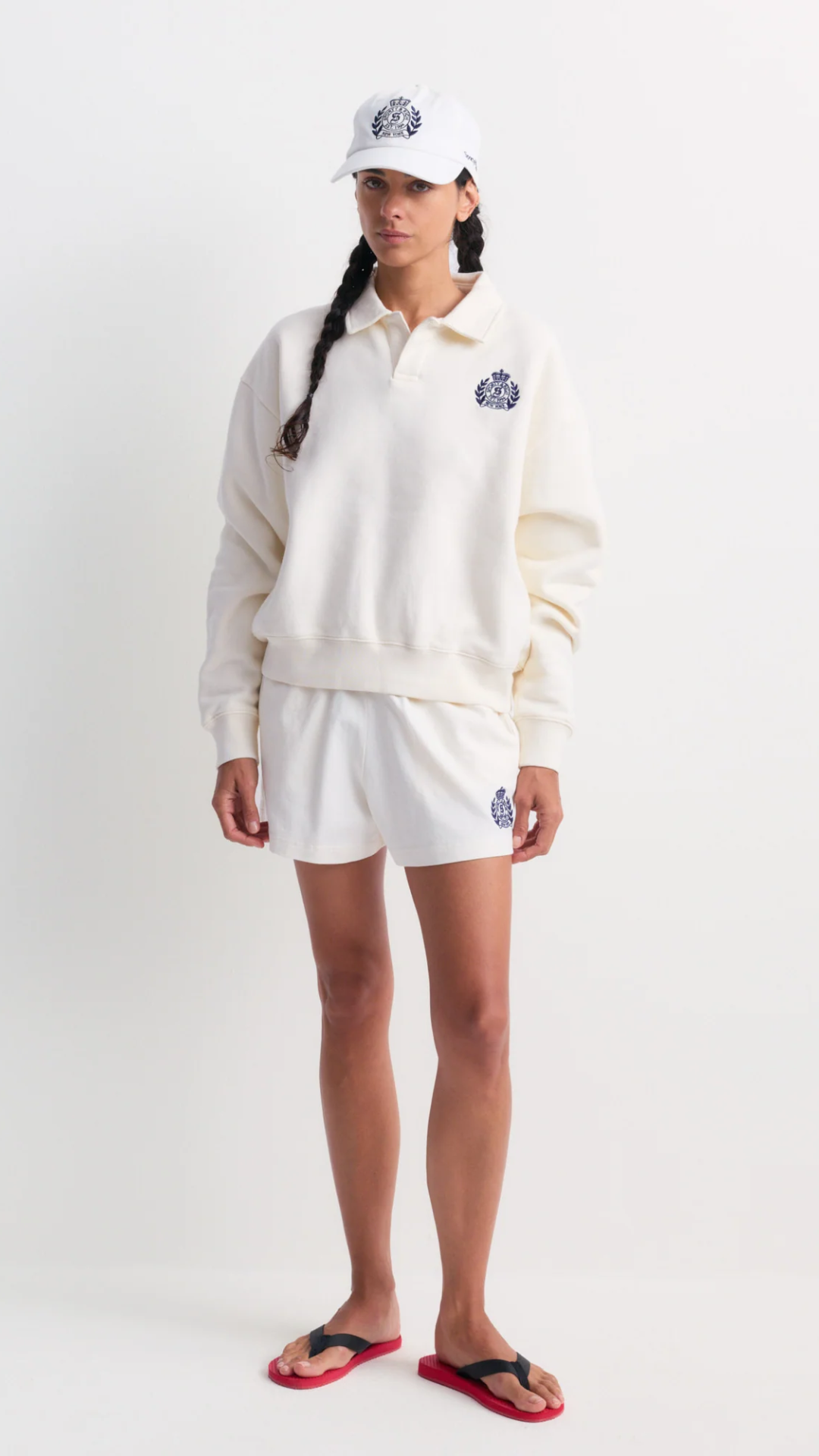 Sporty & Rich Elfa NY Crest Embroidered Open Polo in Off White
