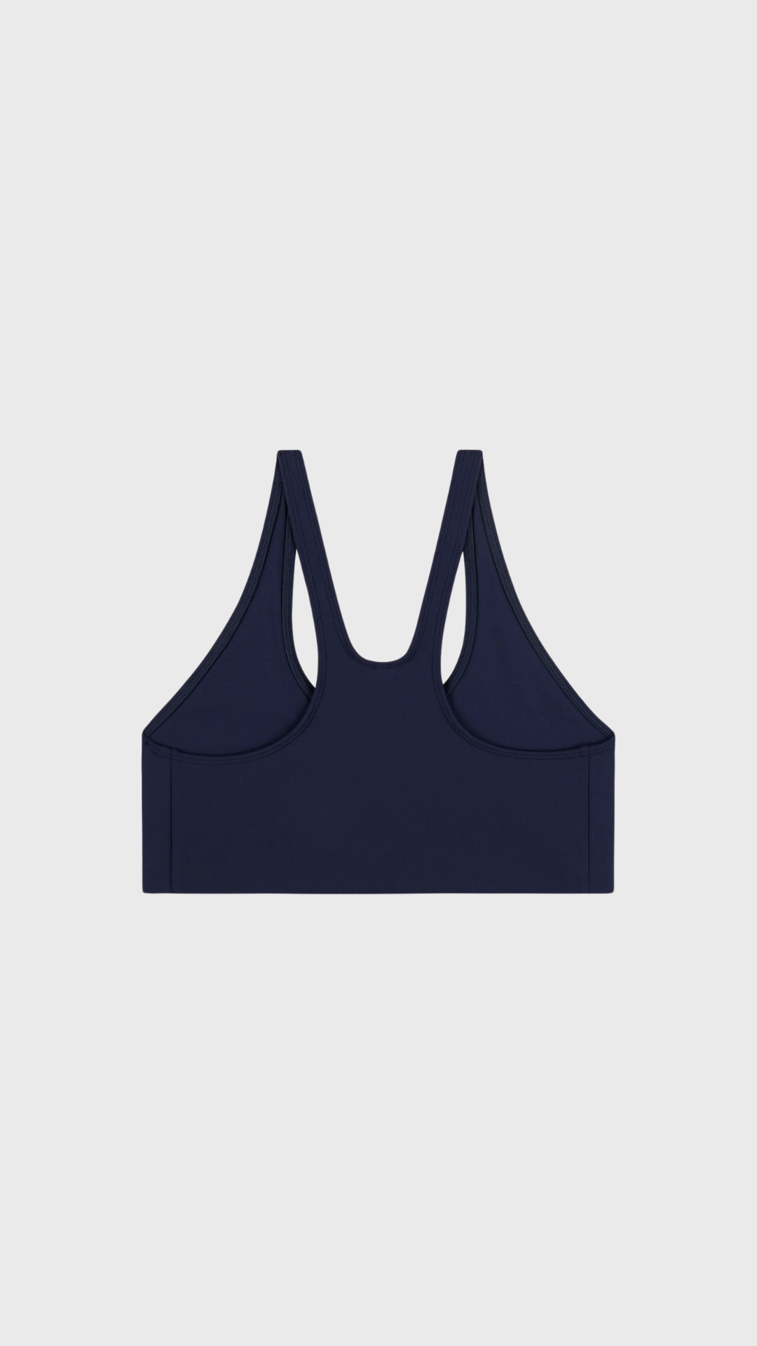 Sporty & Rich Signature Logo Sports Bra in Dark Navy