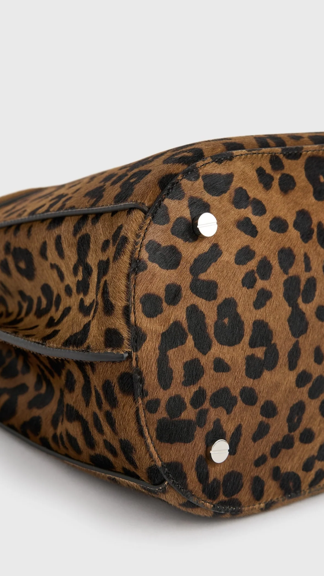 Toteme Belted Pony Hair Bucket Bag in Leopard