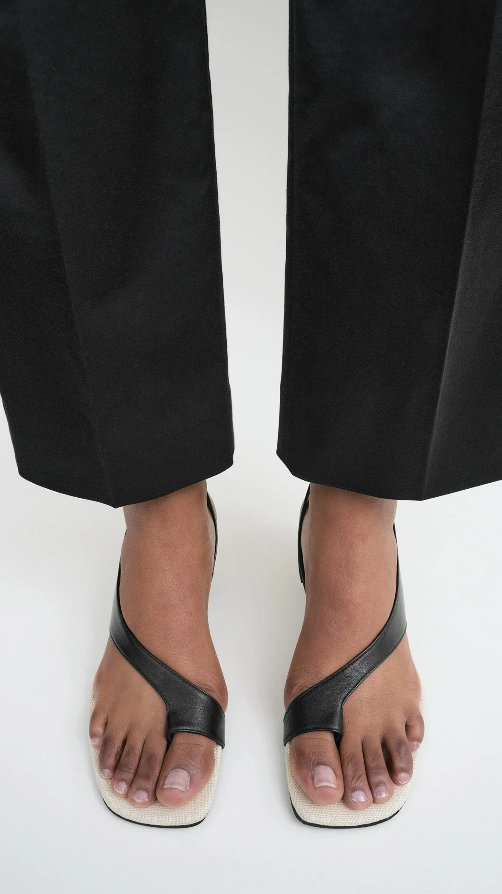 Toteme Leather Heeled Thong Sandals in Black Sand